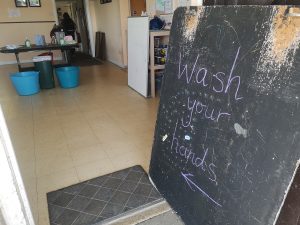 'Wash Your Hands' sign Junior Week 2024